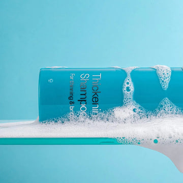 Thickening Shampoo lifestyle texture image by Skincare by Dr.V
