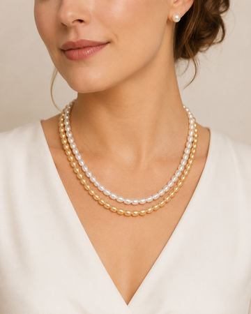 Model wearing classic layered pearl necklace set