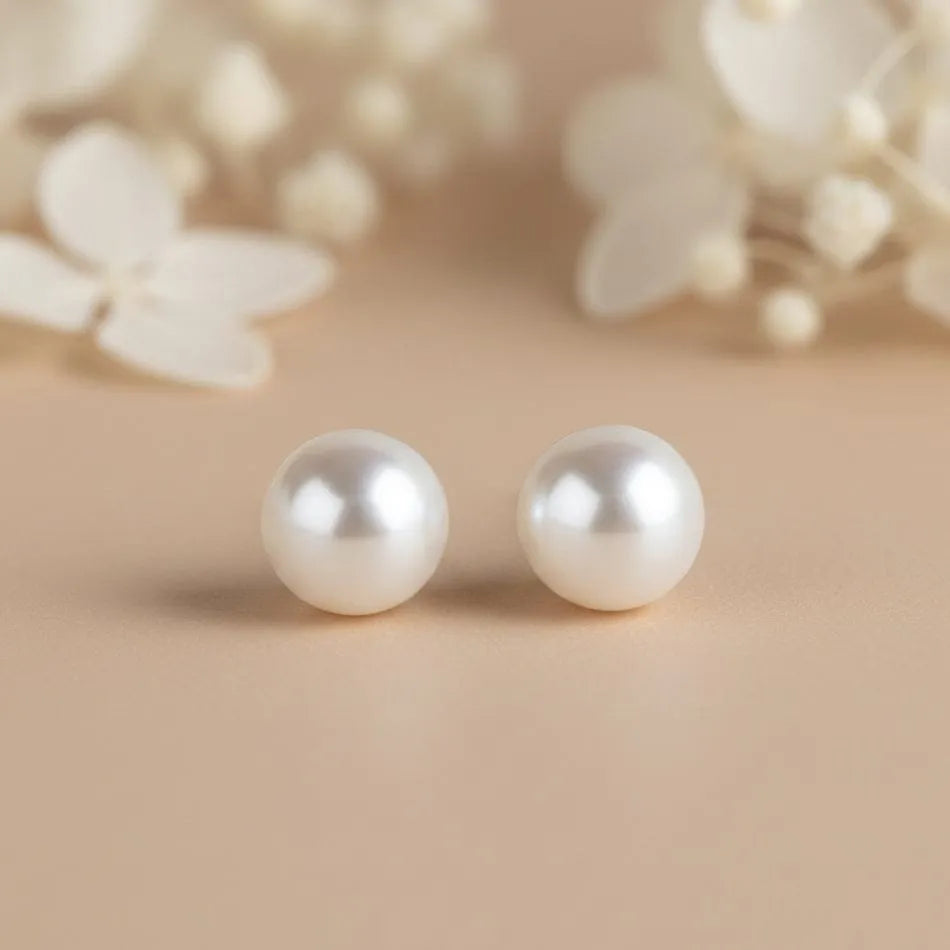 Freshwater pearl stud earrings white pearl flatlay product image