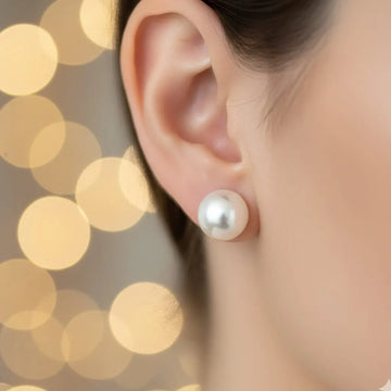 Freshwater pearl stud earrings white pearl on-ear model view