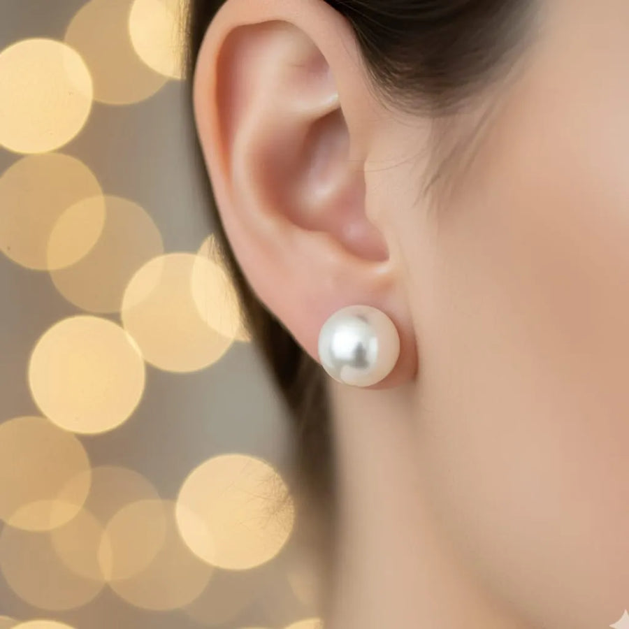 Freshwater pearl stud earrings white pearl on-ear model view