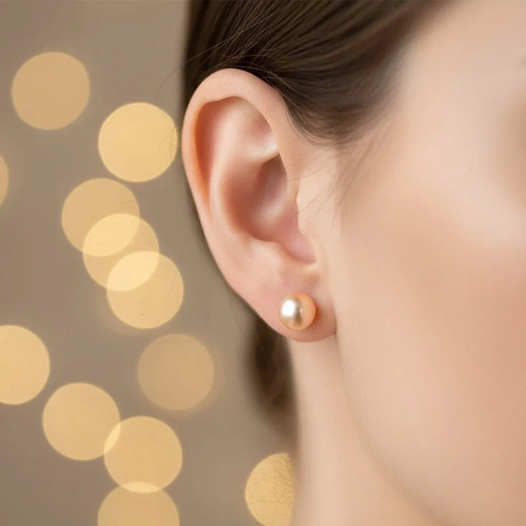 Freshwater pearl stud earrings white pearl large on-ear model view